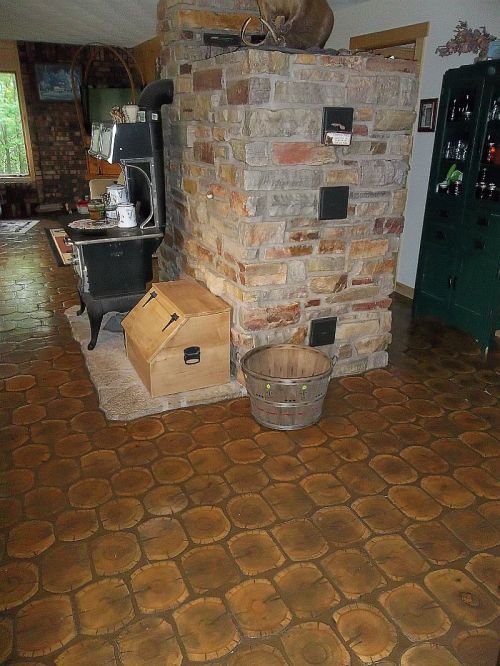 The Russian Masonry Furnace starts in the basement and works its way upward. It keeps the house warm with one firing a day!