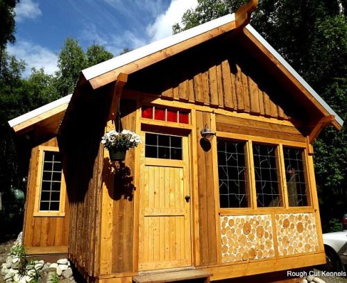 Here is an example of Tim Krause's cordwood front on a board and batten sided cabin in Alaska. 