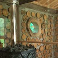 Swedish Cordwood Sauna by Pelle